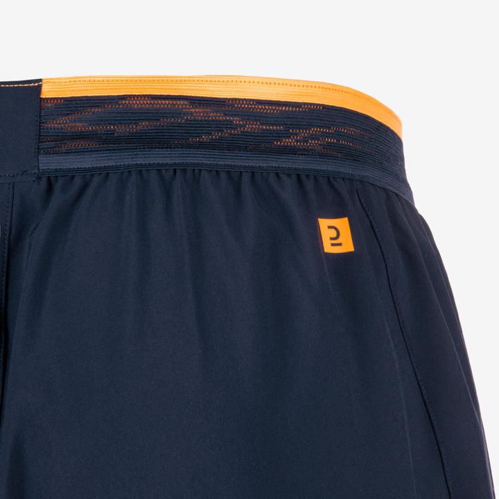 Actual product image Kipsta Ladies/men's football shorts - CLR navy blue/orange (M)