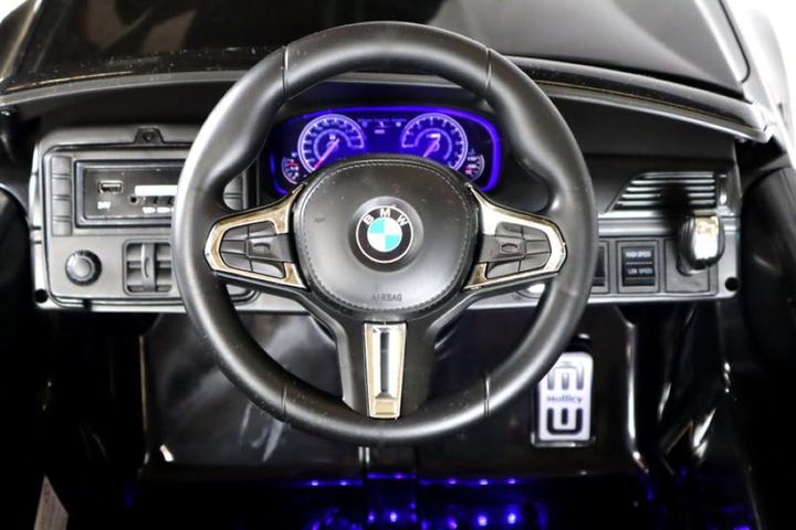 Immagine prodotto Es-toys Veicolo elettrico per bambini "BMW M5" - Licenza - Batteria 12V7A, 2 motori MP3, sedile in pelle + (12 V)