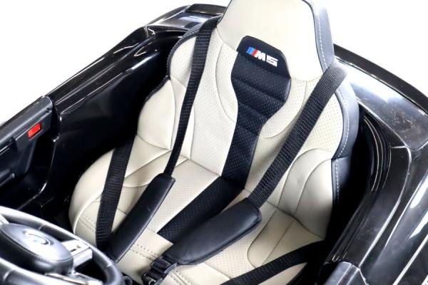 Immagine prodotto Es-toys Veicolo elettrico per bambini "BMW M5" - Licenza - Batteria 12V7A, 2 motori MP3, sedile in pelle + (12 V)