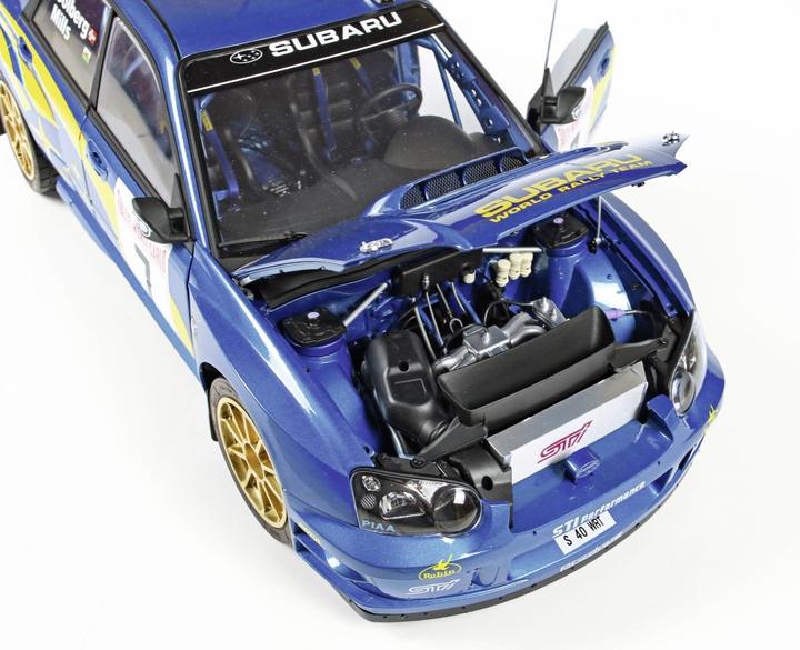 Produktbild Carson 1:8 IXO Subaru Impreza Rally MC 2003