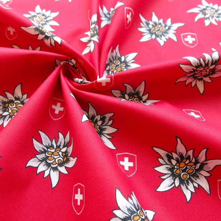 Produktbild Stoffrestposten Beschichtete Baumwolle - Edelweiss und Schweizer Wappen auf Rot - Mindestverkaufsmenge: 1 Meter