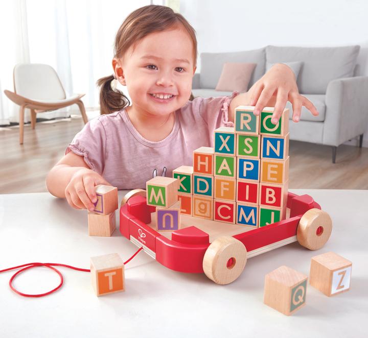 Actual product image Hape Letter blocks in the pull-along trolley