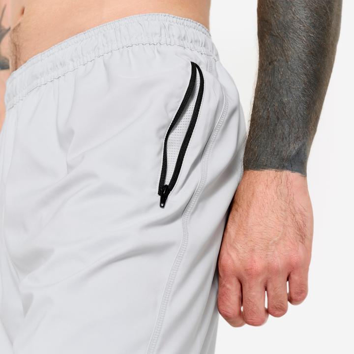 Actual product image Domyos Shorts Herren atmungsaktiv Reissverschlusstaschen - hellgrau (M)