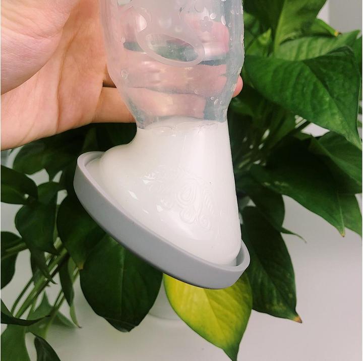 Actual product image Haakaa 100ml Silicone Breast Pump with Suction Base & Silicone Cap