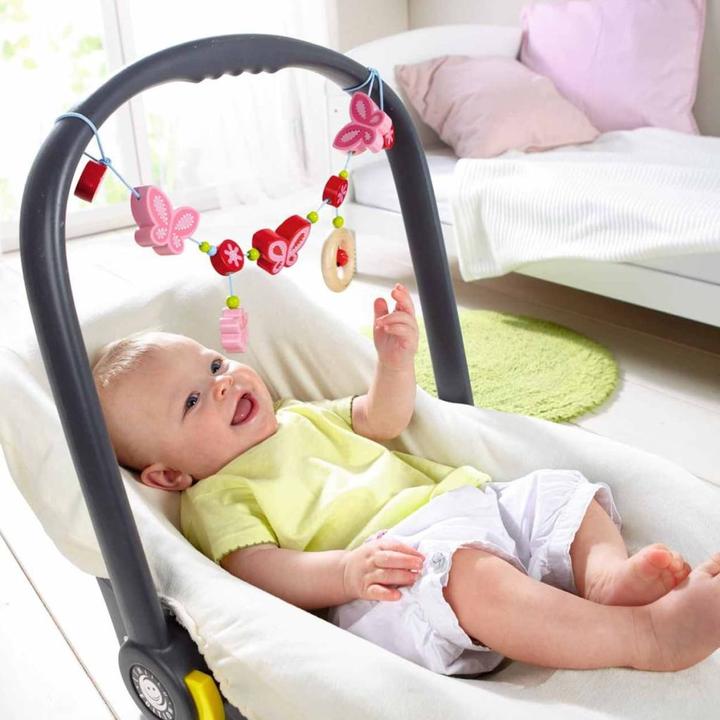 Produktbild Haba Kinderwagenkette Schmetterlingszauber