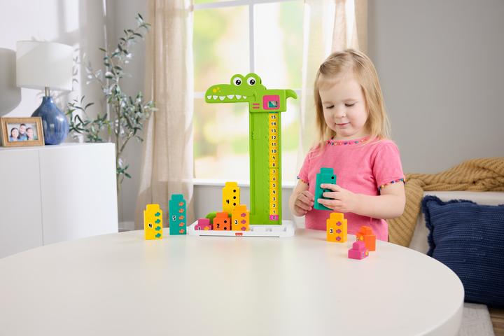 Produktbild Fisher-Price Mein Zahlen-Krokodil (Deutsch, Französisch, Italienisch, Englisch, Schweizerdeutsch)