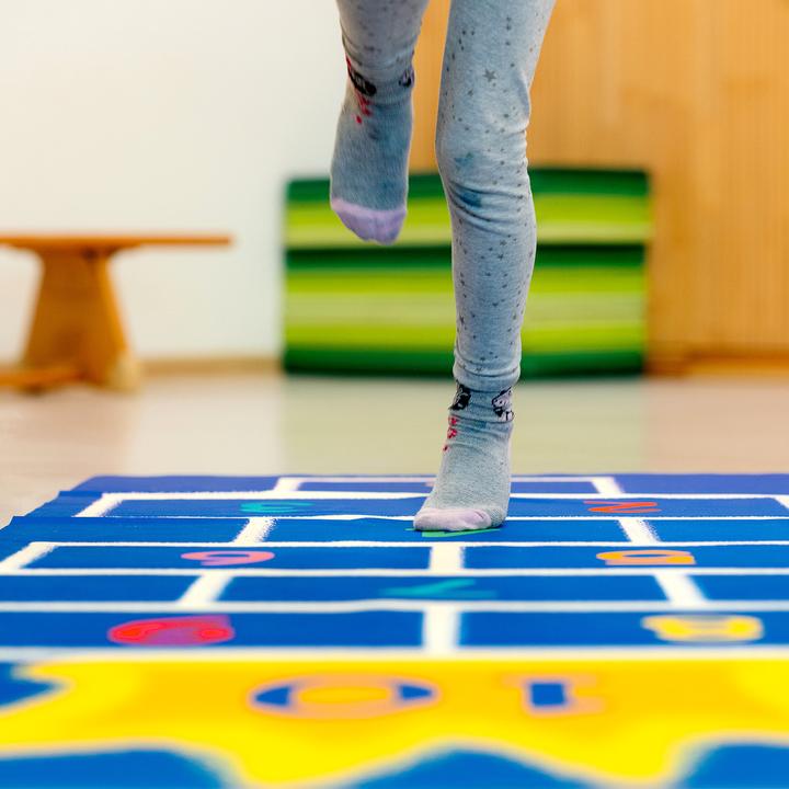 Produktbild Würfelwelt Spielteppich Hüpfkönig