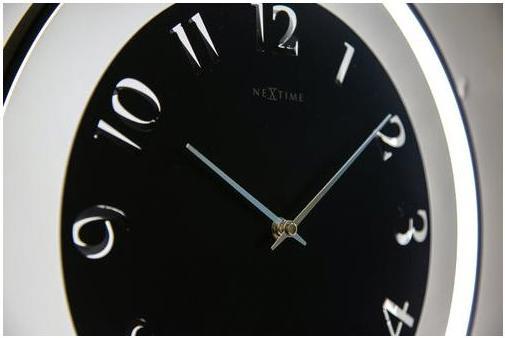 Actual product image Nextime 5188ZW - Table clock "Ting", integrated light, metal, black, 40 x 40,5 cm