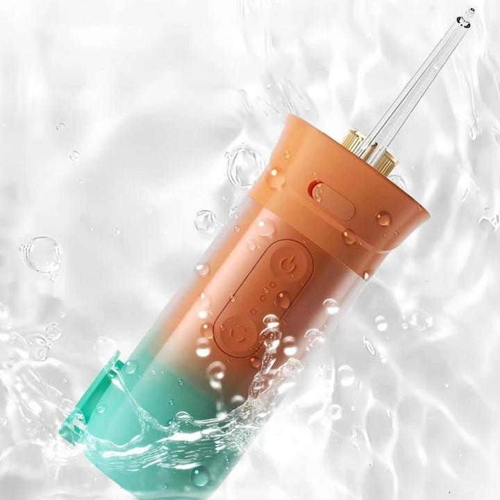 Immagine prodotto OEM Consumer electronics Electric oral irrigator 200 ml 4 tips RC-K-563 orange