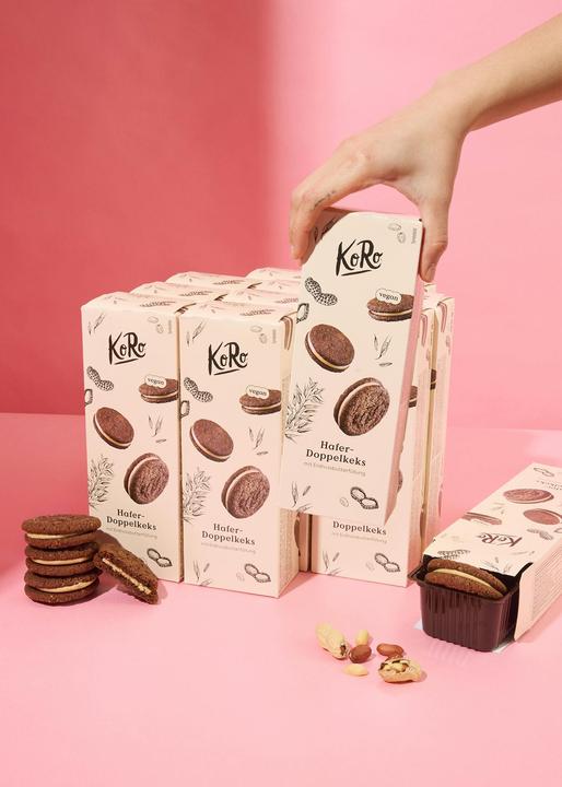 Produktbild KoRo Runder knuspriger Keks mit Hafer und Erdnussbutterfüllung (12 Stk., 180 g)