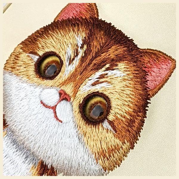 Produktbild Dell Nimmy phone bag khaki Big Eyed Pet 2.0 Cat