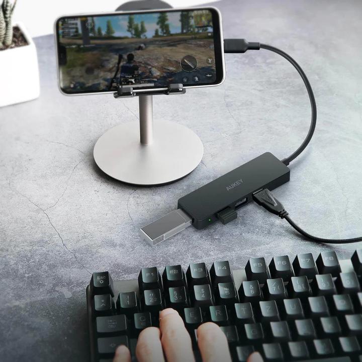 Image du produit Aukey CB-C64 Concentrateur d'interface Noir Gris (USB-C, 4 Ports)