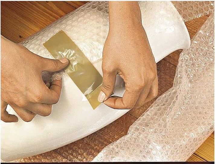 Actual product image tesa tesapack ULTRA STRONG Parcel Tape - PVC packing tape for tight packing and secure bundling (50 mm)