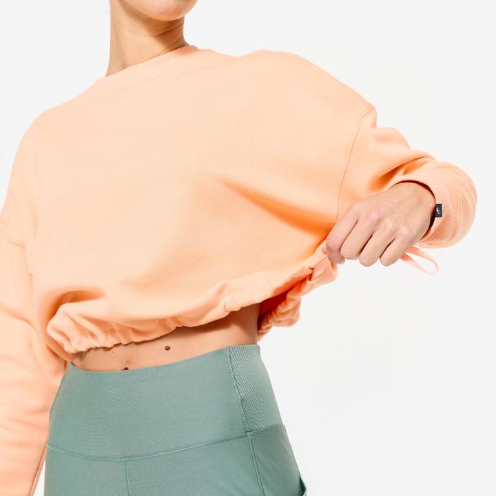 Produktbild Domyos Sweatshirt Crop Damen bequem dehnbar - pfirsich/orange (S)