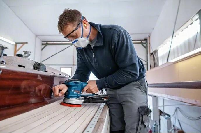 Actual product image Bosch Professional Random orbital sander GEX 34-150, sanding disc, 1 x paper dust bag, 1 x dust extraction pad. (Eccentric grinder, 340 W)
