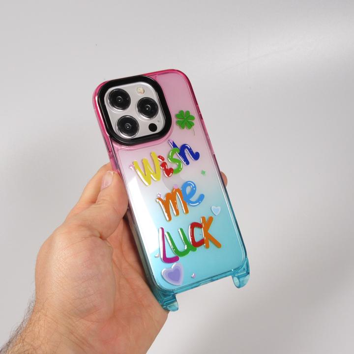 Image du produit PhoneLook Coque Gel transparent WISH ME LUCK avec crochet pour lanière (sans lanière) /bleu (Apple iPhone 15 Pro Max)