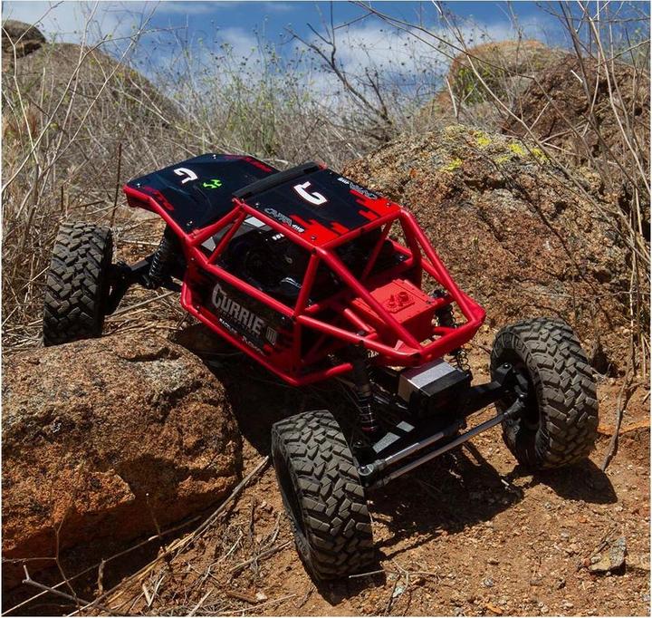 Actual product image Axial Capra 1.9 Unlimited Trail Buggy Electric Brushed Crawler 4WD 1:8 RTR Red (RTR Ready-to-Run)