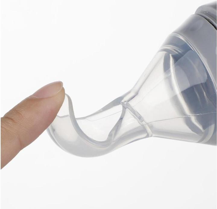 Actual product image Haakaa Squeeze feeding bottle with spoon (120 ml)