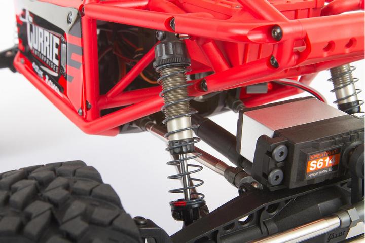 Actual product image Axial Capra 1.9 Unlimited Trail Buggy Electric Brushed Crawler 4WD 1:8 RTR Red (RTR Ready-to-Run)