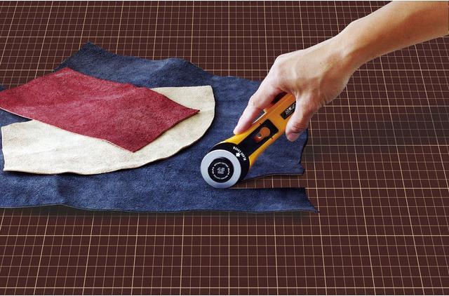 Immagine prodotto Olfa Taglia il tappetino con anelli e coltelli a segmenti