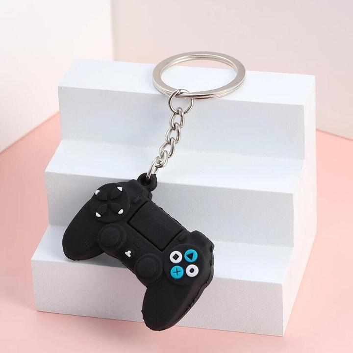 Actual product image JTI Key fob with video game console
