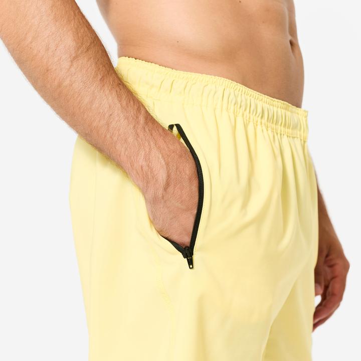 Image du produit Domyos Short de fitness avec poches zippées, jaune pastel (M)