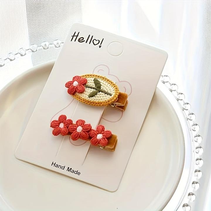 Image du produit Activity Board Gestrickte rote Blume Haarspange