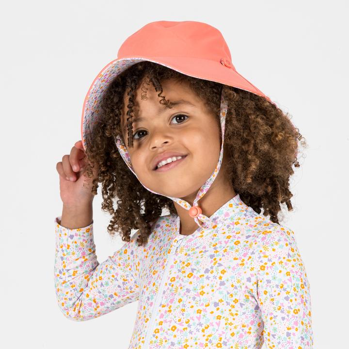Image du produit Nabaiji Chapeau anti UV réversible Bébé - corail et imprimés fleurs