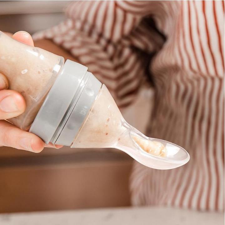 Actual product image Haakaa Squeeze feeding bottle with spoon (120 ml)