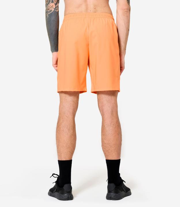 Actual product image Domyos Shorts Reissverschlusstaschen - orange (M)