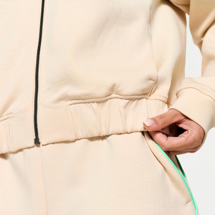 Image du produit Domyos Veste bombers zipée femme, beige avec piping vert. (XL)