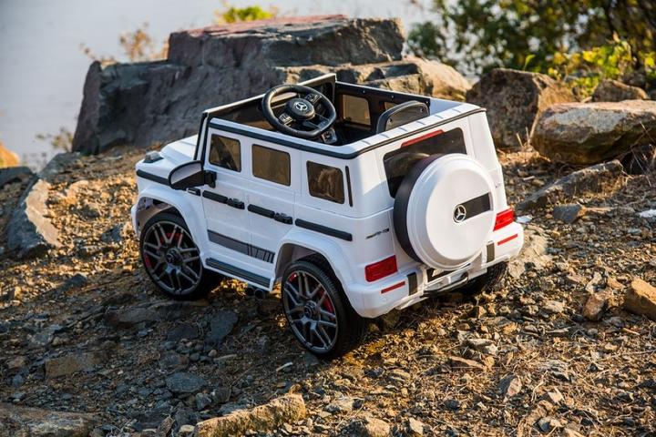 Produktbild Es-toys Kinderfahrzeug weiss - Elektro Auto "Mercedes G63 AMG" - Lizenziert - 12V7AH Akku,2 Motoren (12 V)