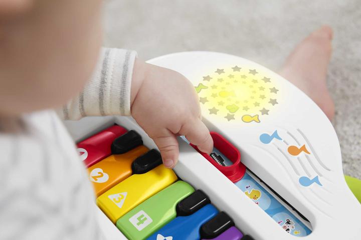 Actual product image Fisher-Price Doggy Piano Laugh & Learn Multilingual Edition, Portable with Lights, Verses d