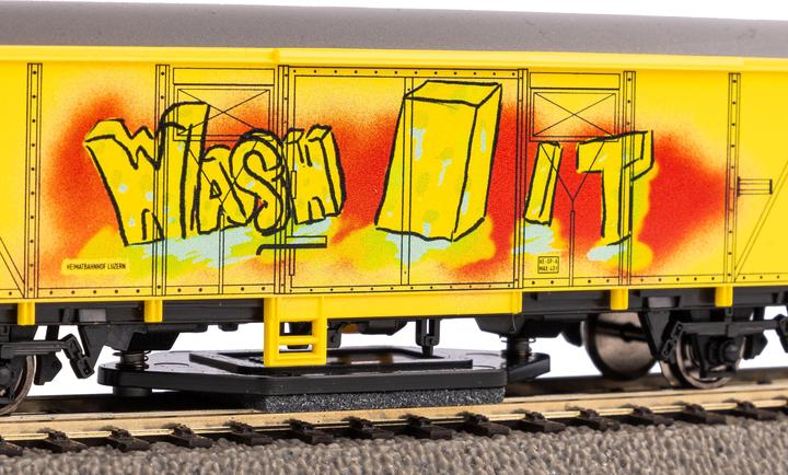 Actual product image Piko H0 54309 H0 Rail cleaning wagon yellow with SBB graffiti (Track H0)
