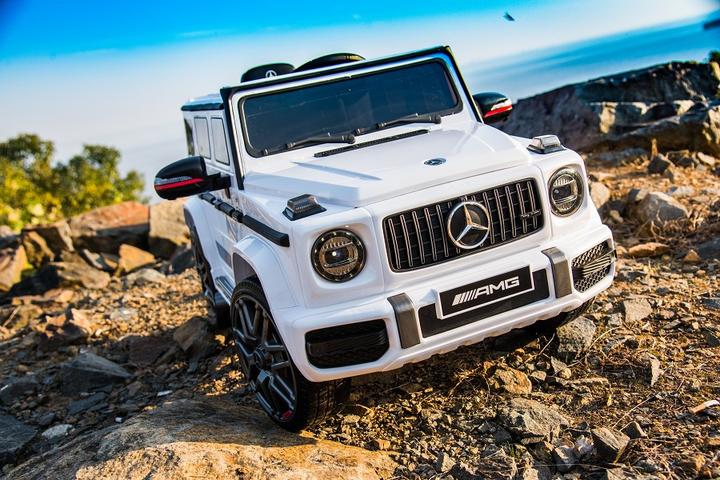Produktbild Es-toys Kinderfahrzeug weiss - Elektro Auto "Mercedes G63 AMG" - Lizenziert - 12V7AH Akku,2 Motoren (12 V)